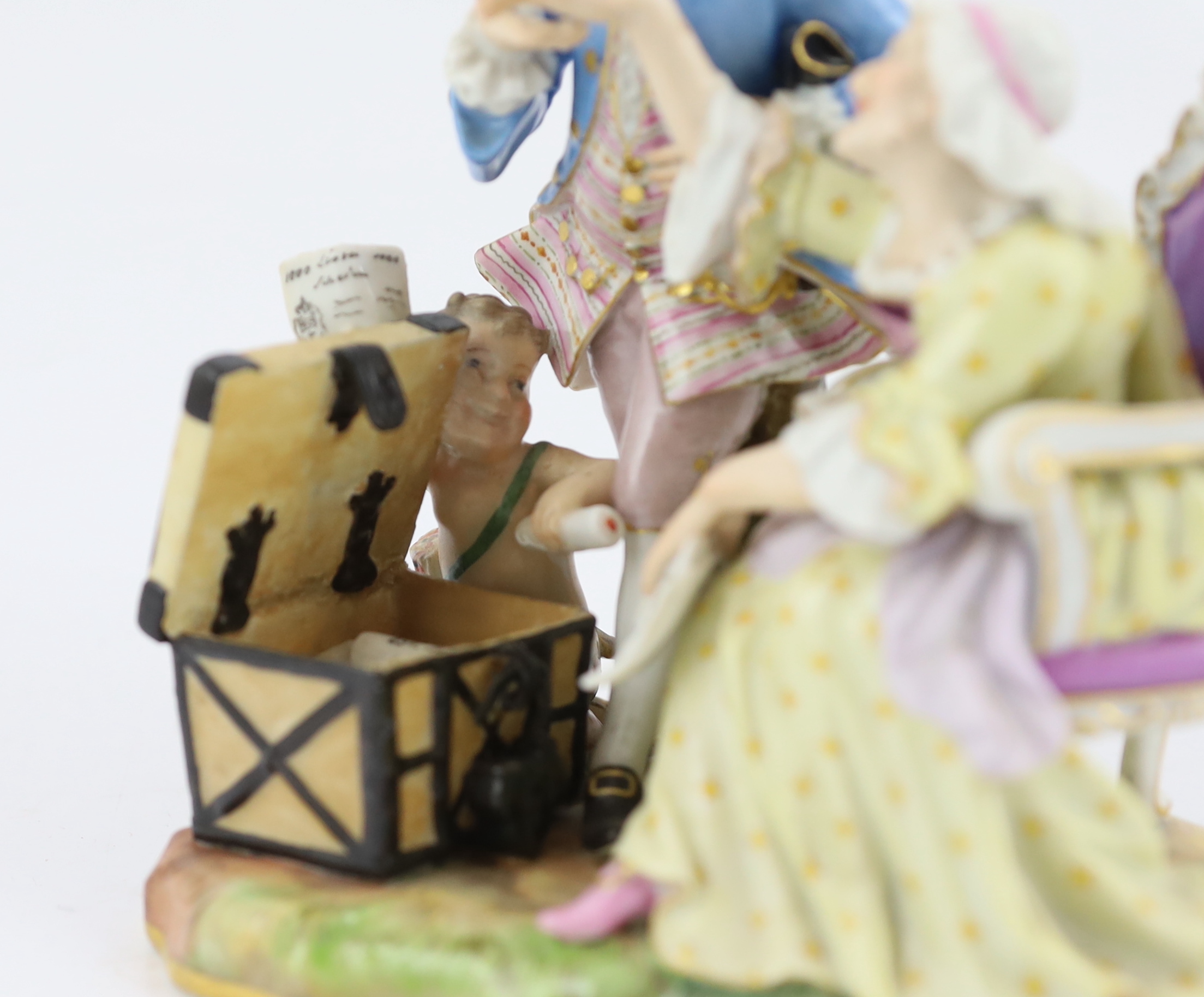 A Meissen group of an old woman and her young lover, 19th century, some restoration